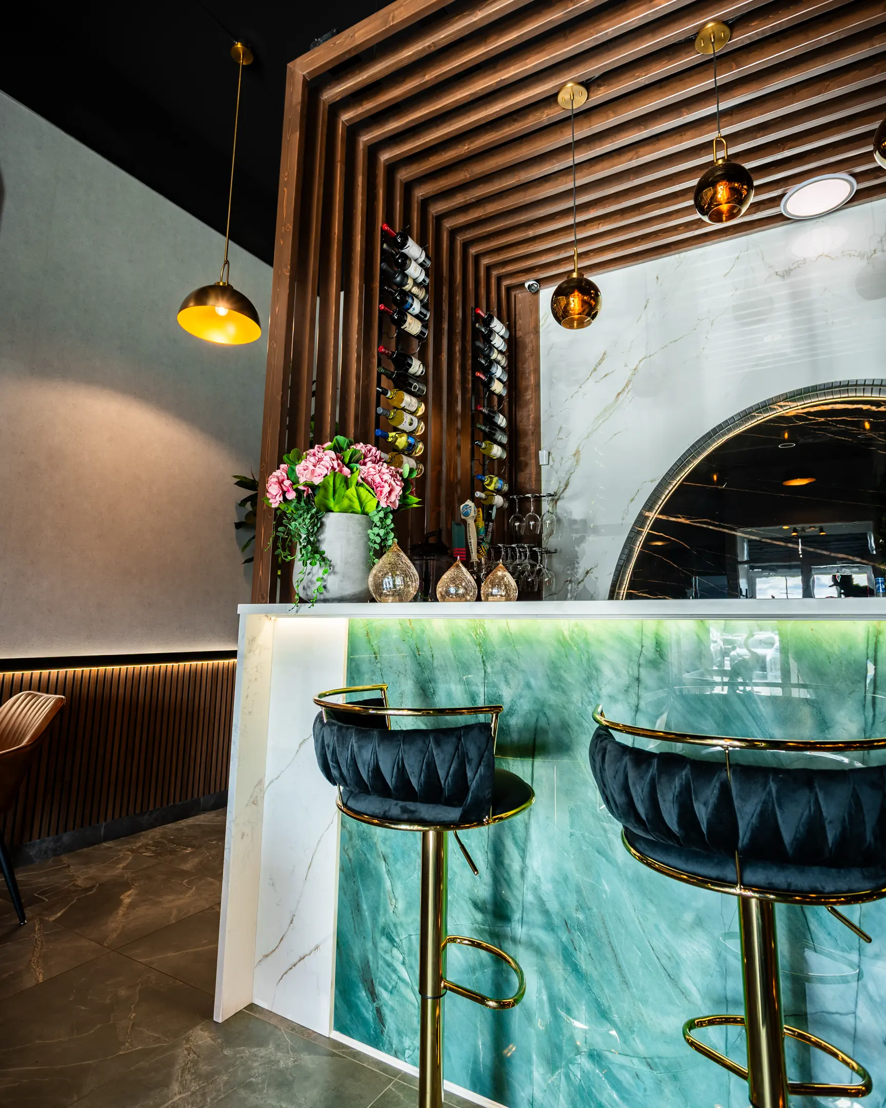 Bar counter and stools at Masala Theory Indian Bistro & Bar in Calgary SE